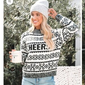 Ivory And Grey Aztec Print
Cheers Sweater